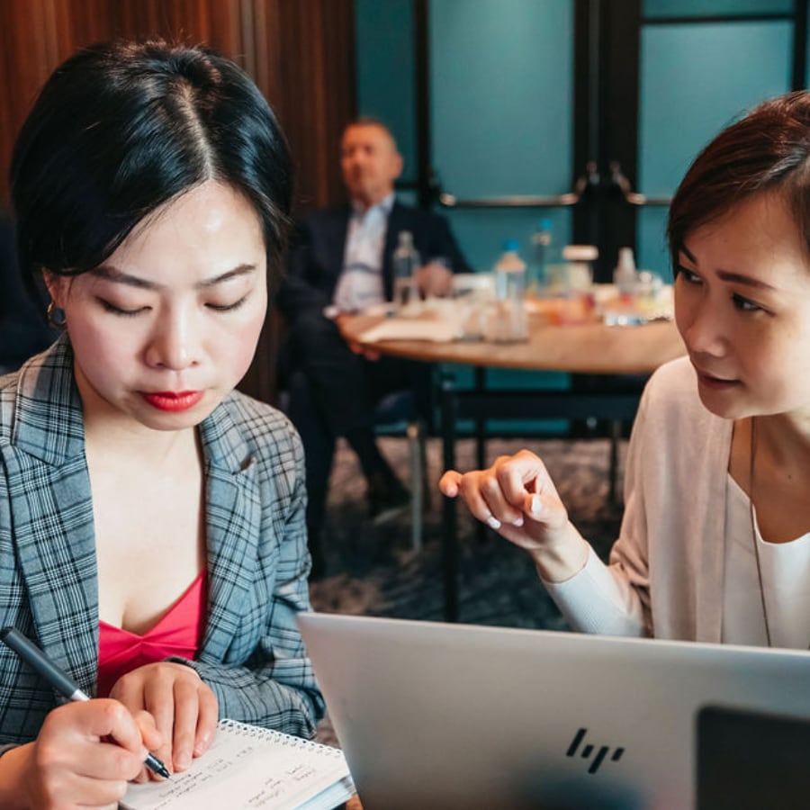 Two-women-working-together-with-laptop-900 Two-women-working-together-with-laptop-900